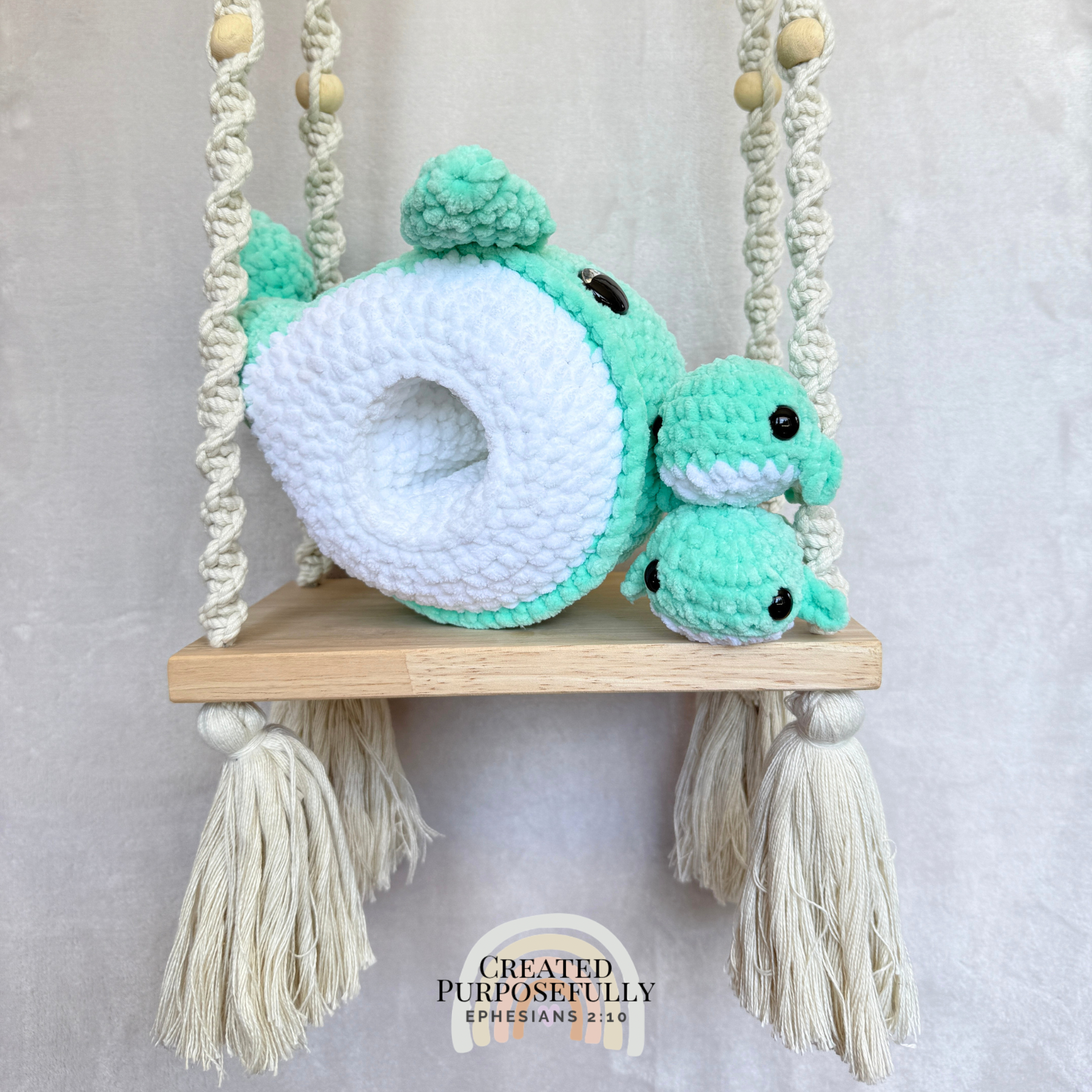 Handmade crochet whale family with one mama whale and two baby whales made with soft plush yarn