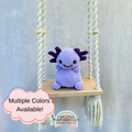 Handmade crochet axolotl plush with fluffy gills made with soft cuddly yarn by Created Purposefully