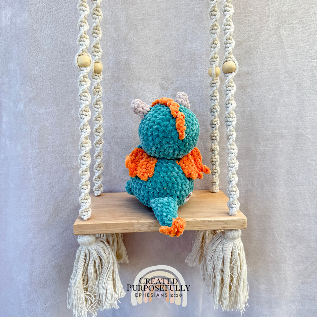 Handmade crochet dragon plush with wings made from soft cuddly yarn by Created Purposefully