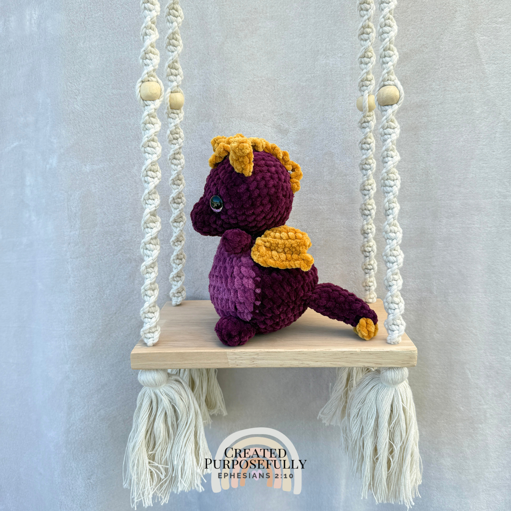 Handmade crochet dragon plush with wings made from soft cuddly yarn by Created Purposefully