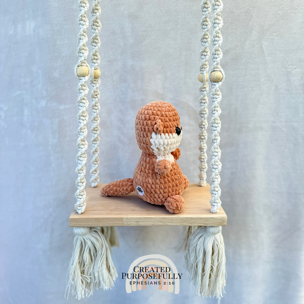 Handmade crochet otter plush made with soft cuddly yarn by Created Purposefully