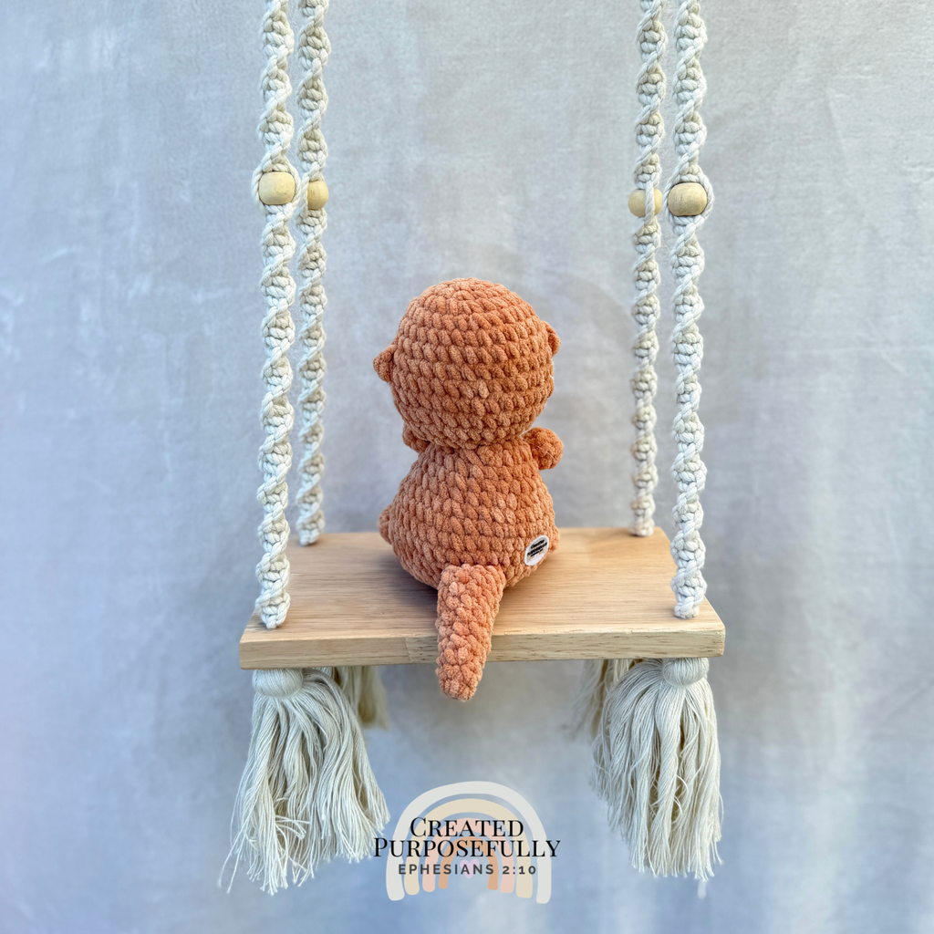 Handmade crochet otter plush made with soft cuddly yarn by Created Purposefully