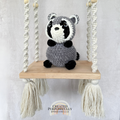 Handmade crochet raccoon plush with a classic masked face made with soft cuddly yarn by Created Purposefully