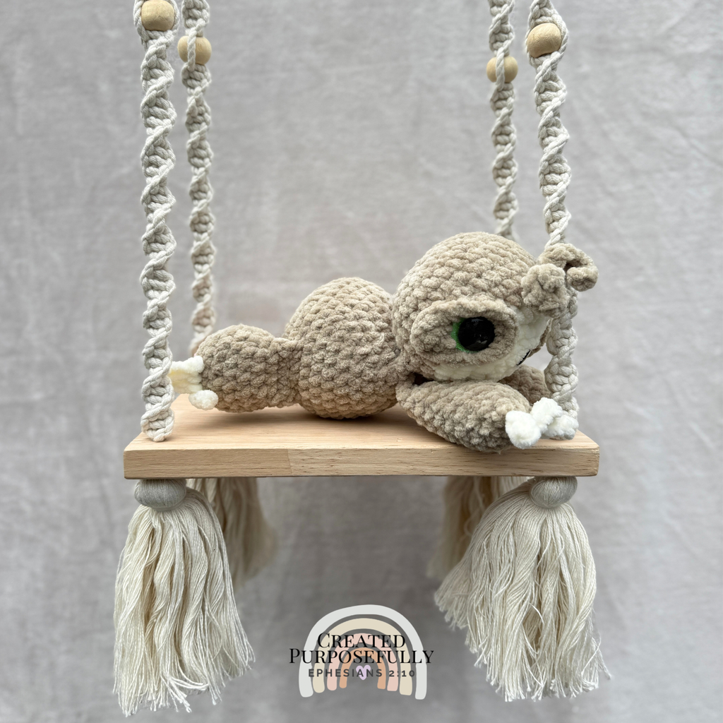 Handmade crochet sloth plush with a sweet face made with soft cuddly yarn by Created Purposefully