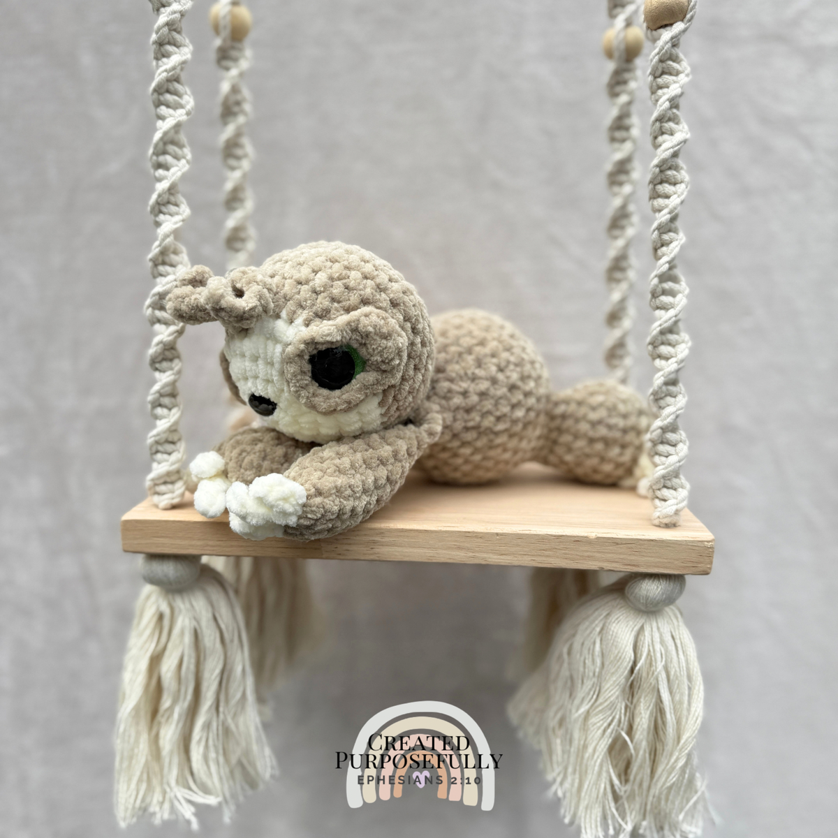 Handmade crochet sloth plush with a sweet face made with soft cuddly yarn by Created Purposefully