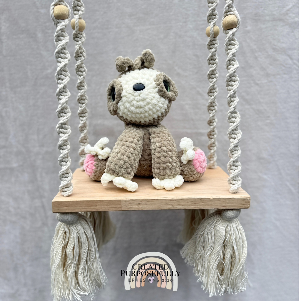 Handmade crochet sloth plush with a sweet face made with soft cuddly yarn by Created Purposefully