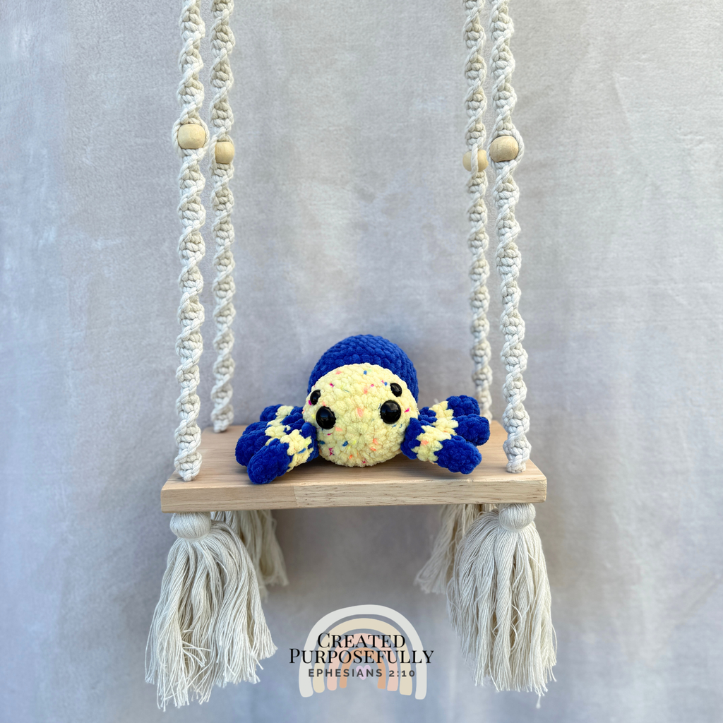 Handmade crochet spider plush with eight legs made with soft cuddly yarn by Created Purposefully