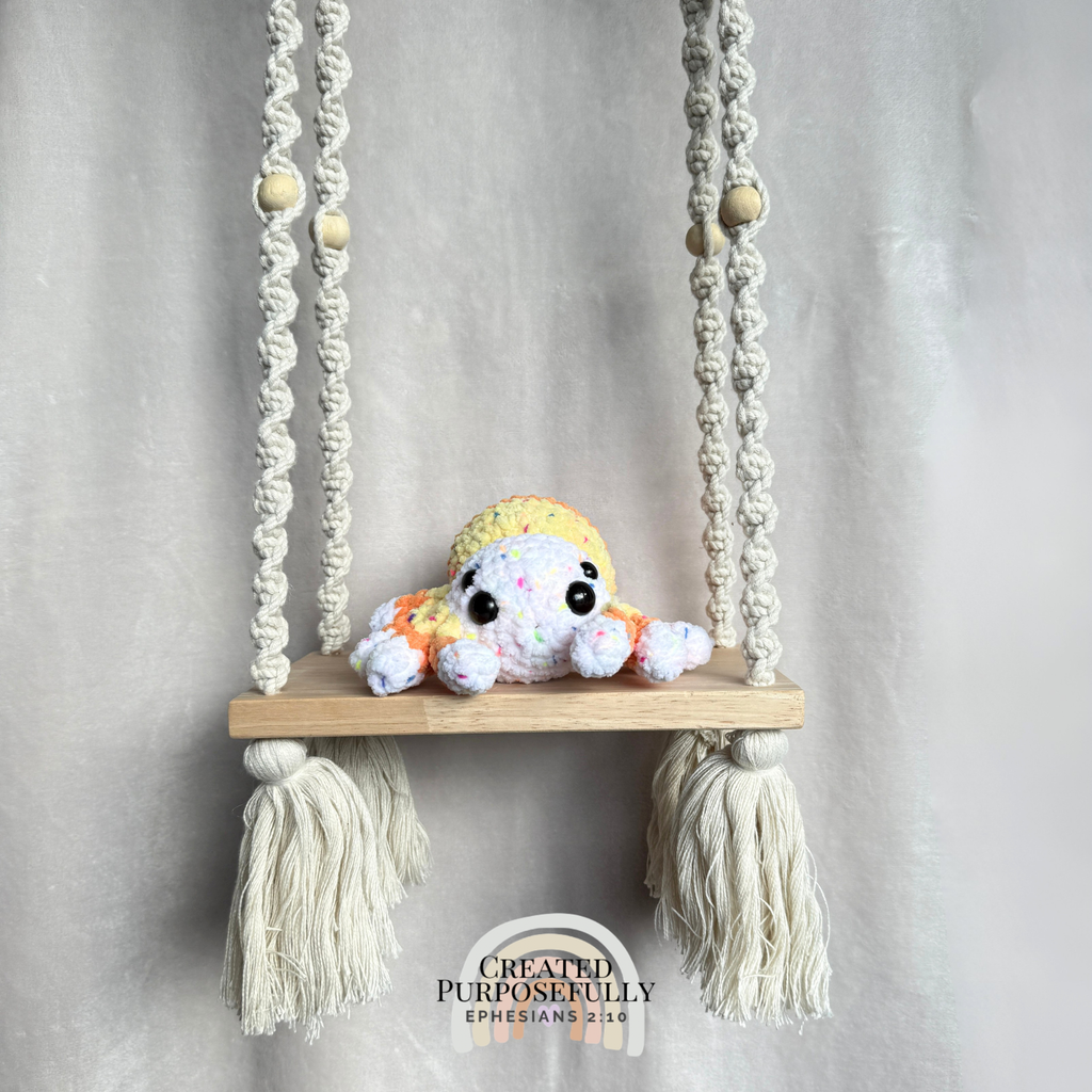Handmade crochet spider plush with eight legs made with soft cuddly yarn by Created Purposefully