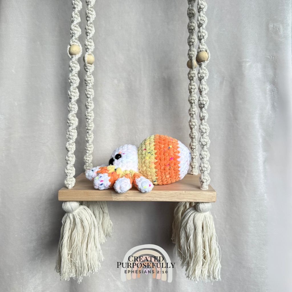 Handmade crochet spider plush with eight legs made with soft cuddly yarn by Created Purposefully