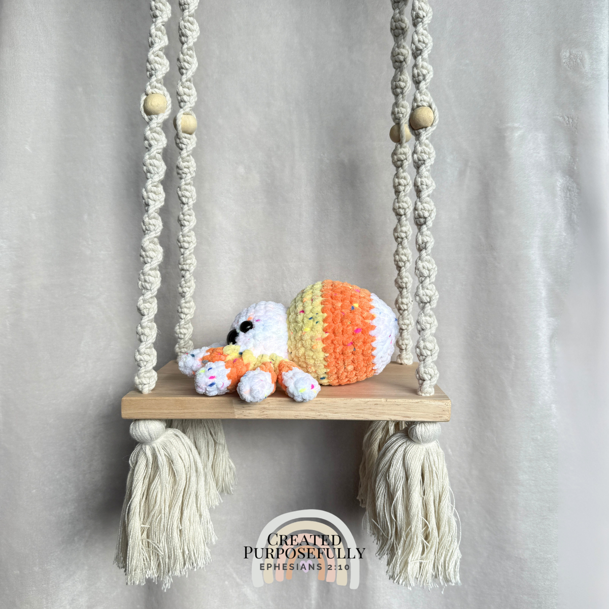 Handmade crochet spider plush with eight legs made with soft cuddly yarn by Created Purposefully