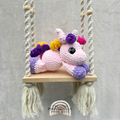 Handmade crochet unicorn plush with a magical horn and colorful mane made with soft cuddly yarn by Created Purposefully