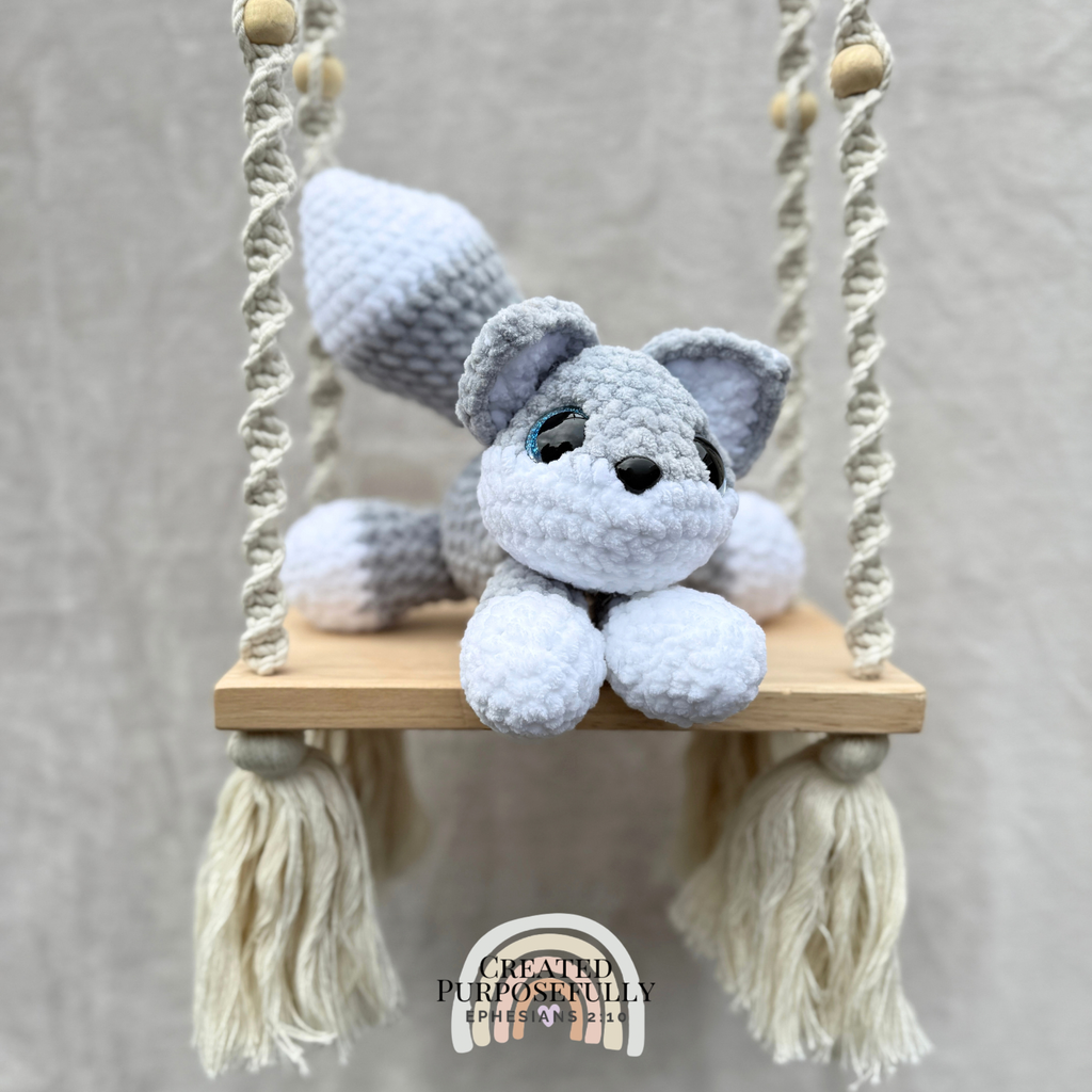Handmade crochet wolf plush with pointed ears and fluffy tail made with soft cuddly yarn by Created Purposefully