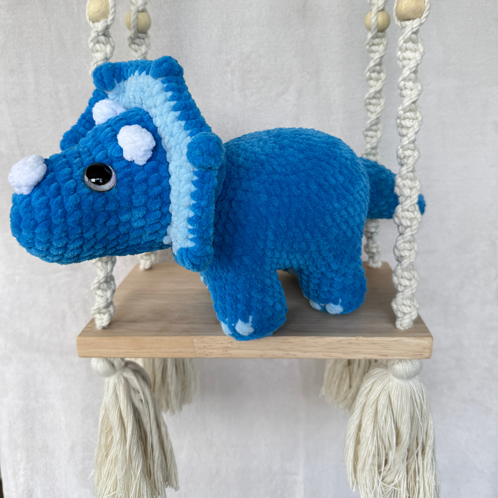 Handmade blue standing triceratops crochet plush made with soft plush yarn and adorable dinosaur details