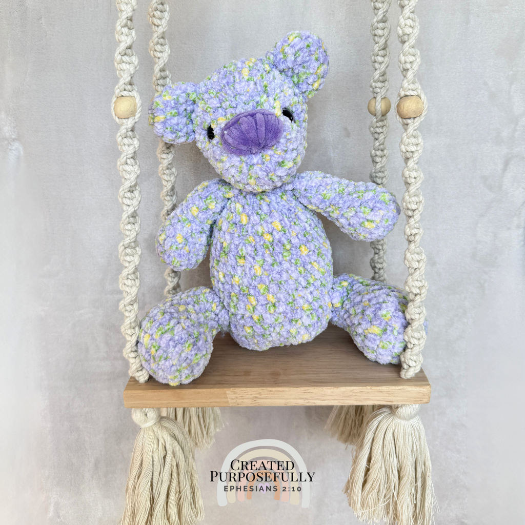 Handmade crochet bear plush in blue, gray, or purple mixed colors made with soft plush yarn and adorable handmade details