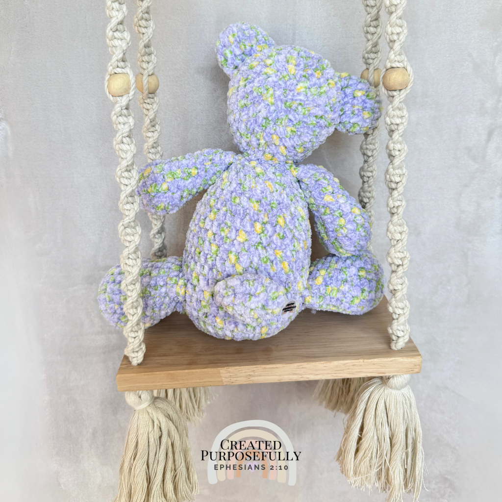 Handmade crochet bear plush in blue, gray, or purple mixed colors made with soft plush yarn and adorable handmade details