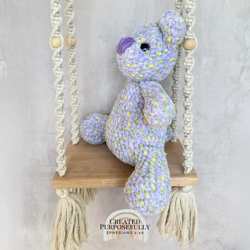 Handmade crochet bear plush in blue, gray, or purple mixed colors made with soft plush yarn and adorable handmade details