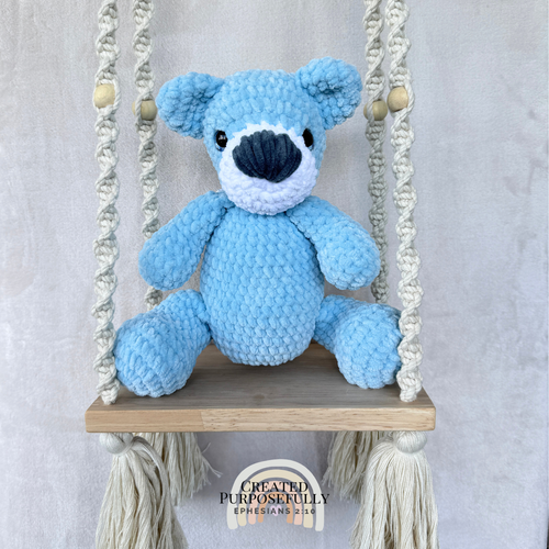 Handmade crochet bear plush in blue, gray, or purple mixed colors made with soft plush yarn and adorable handmade details