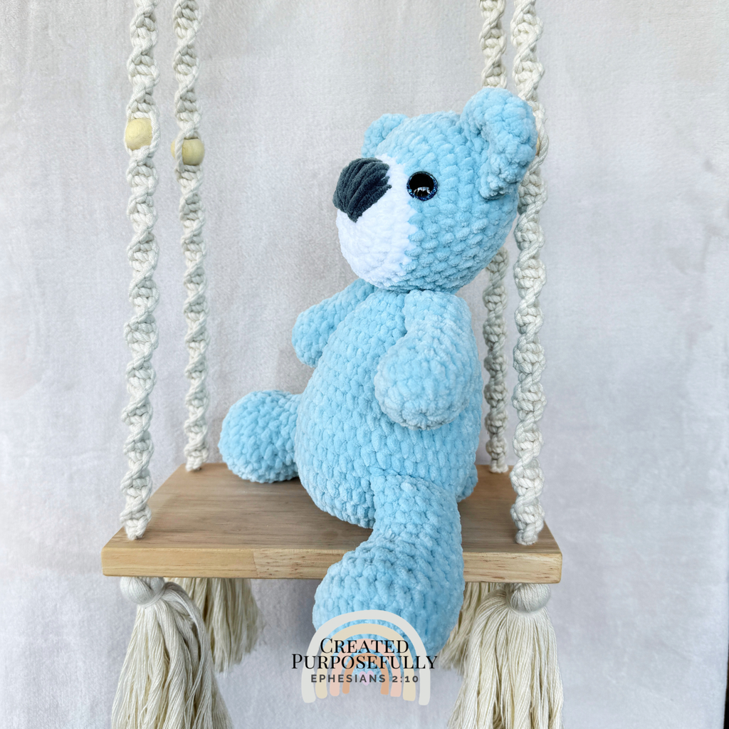 Handmade crochet bear plush in blue, gray, or purple mixed colors made with soft plush yarn and adorable handmade details