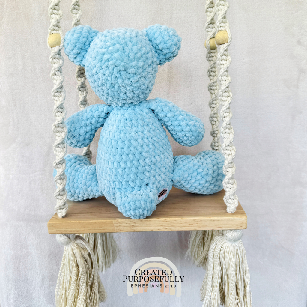 Handmade crochet bear plush in blue, gray, or purple mixed colors made with soft plush yarn and adorable handmade details