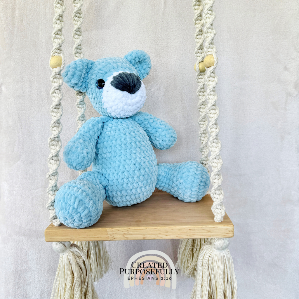 Handmade crochet bear plush in blue, gray, or purple mixed colors made with soft plush yarn and adorable handmade details