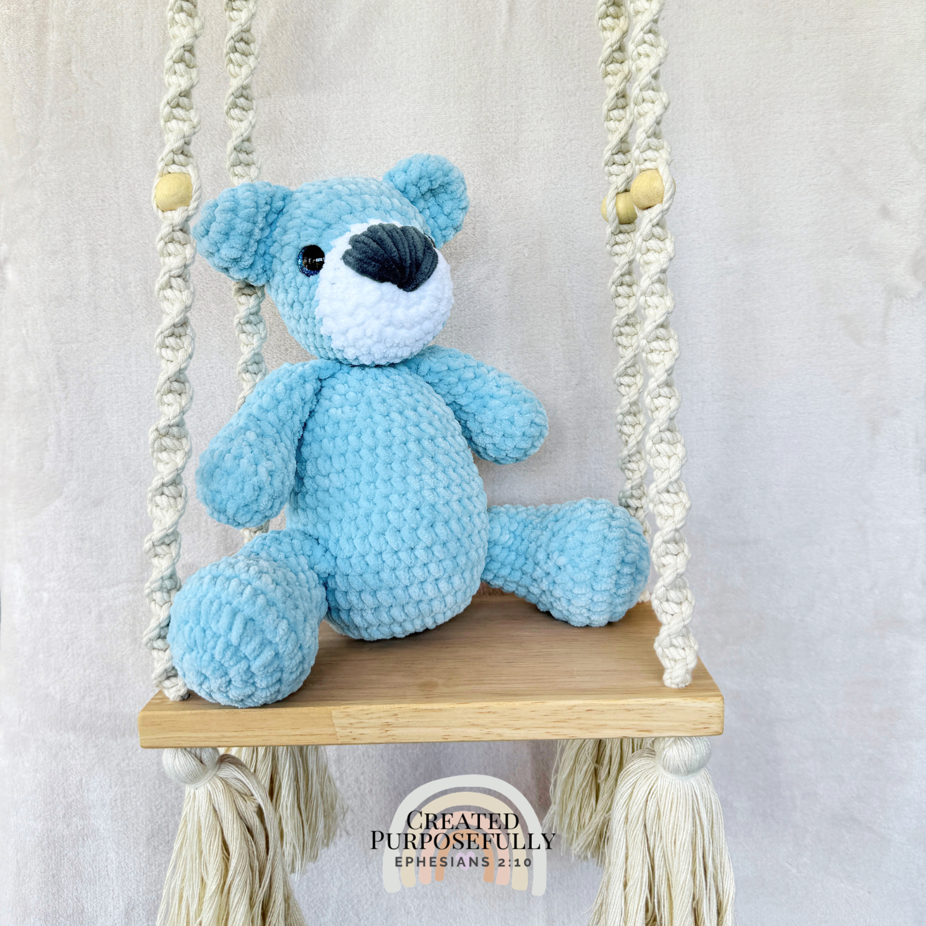 Handmade crochet bear plush in blue, gray, or purple mixed colors made with soft plush yarn and adorable handmade details