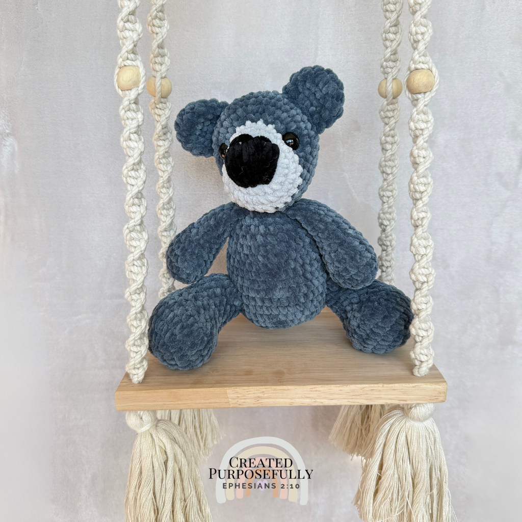 Handmade crochet bear plush in blue, gray, or purple mixed colors made with soft plush yarn and adorable handmade details
