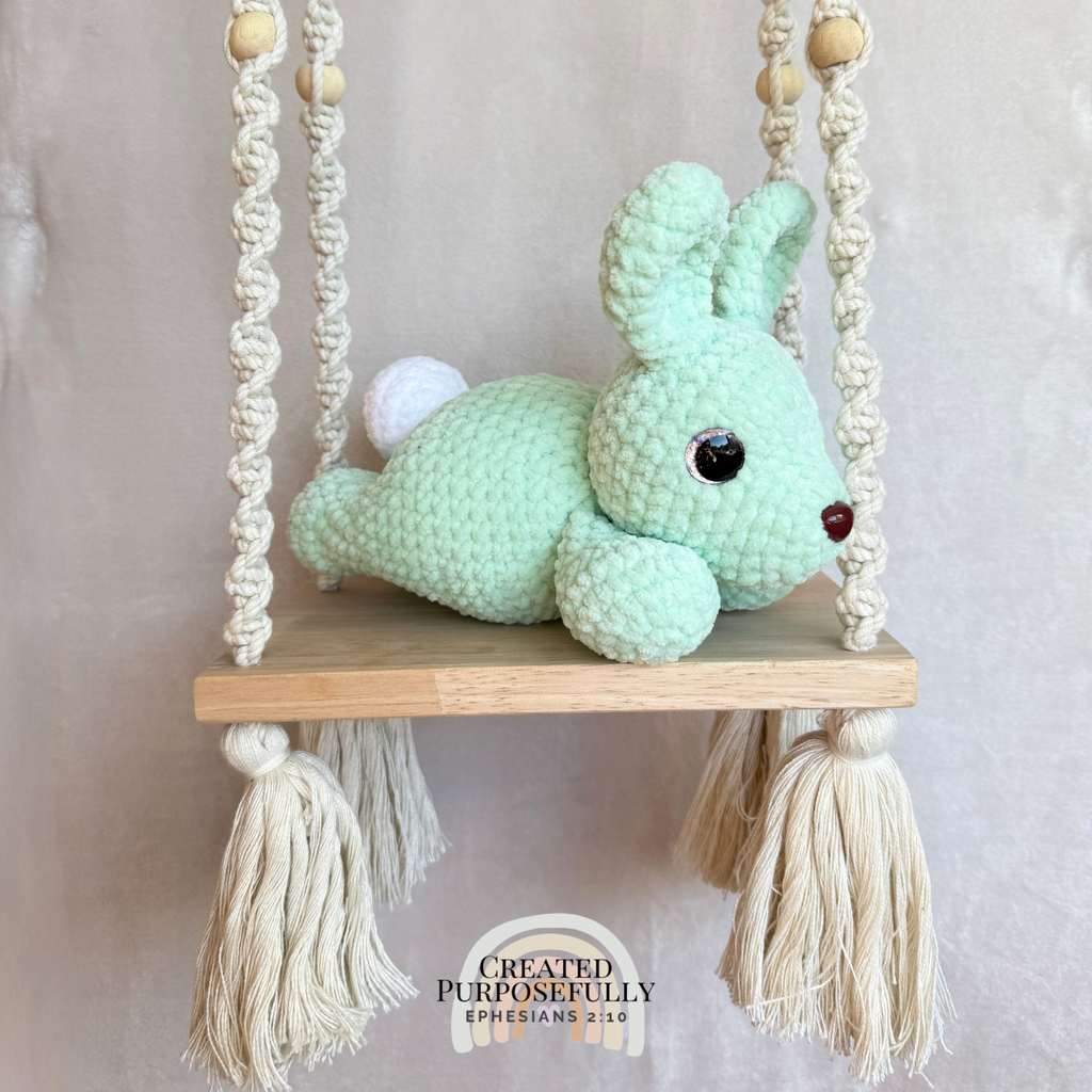 Handmade crochet bunny plush made with soft plush yarn and adorable handmade details