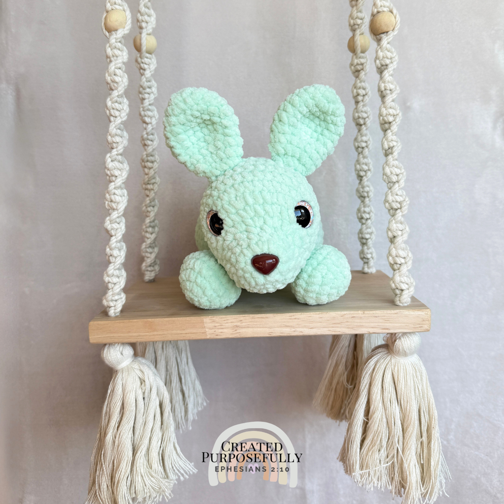 Handmade crochet bunny plush made with soft plush yarn and adorable handmade details