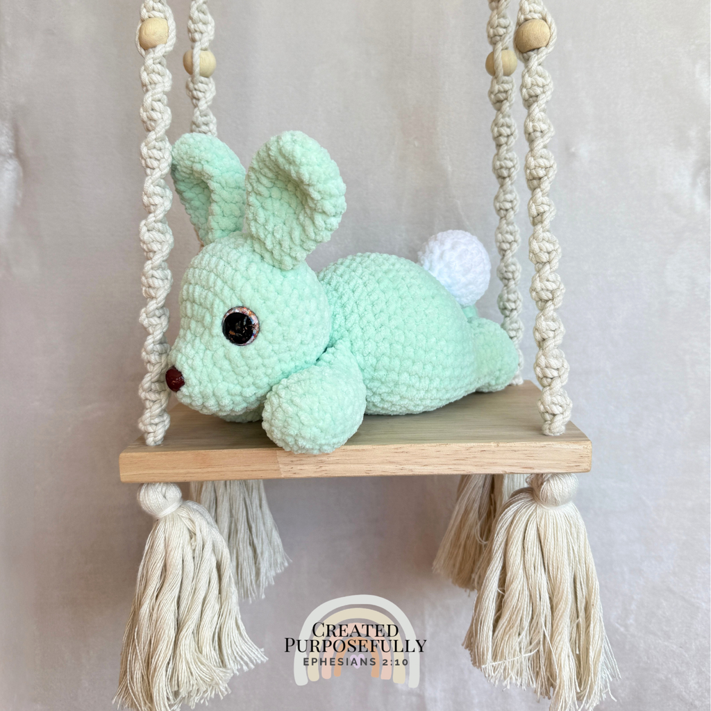 Handmade crochet bunny plush made with soft plush yarn and adorable handmade details
