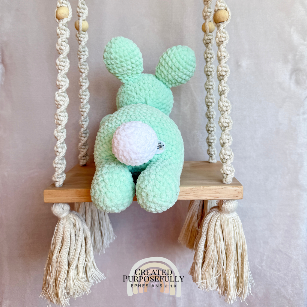 Handmade crochet bunny plush made with soft plush yarn and adorable handmade details