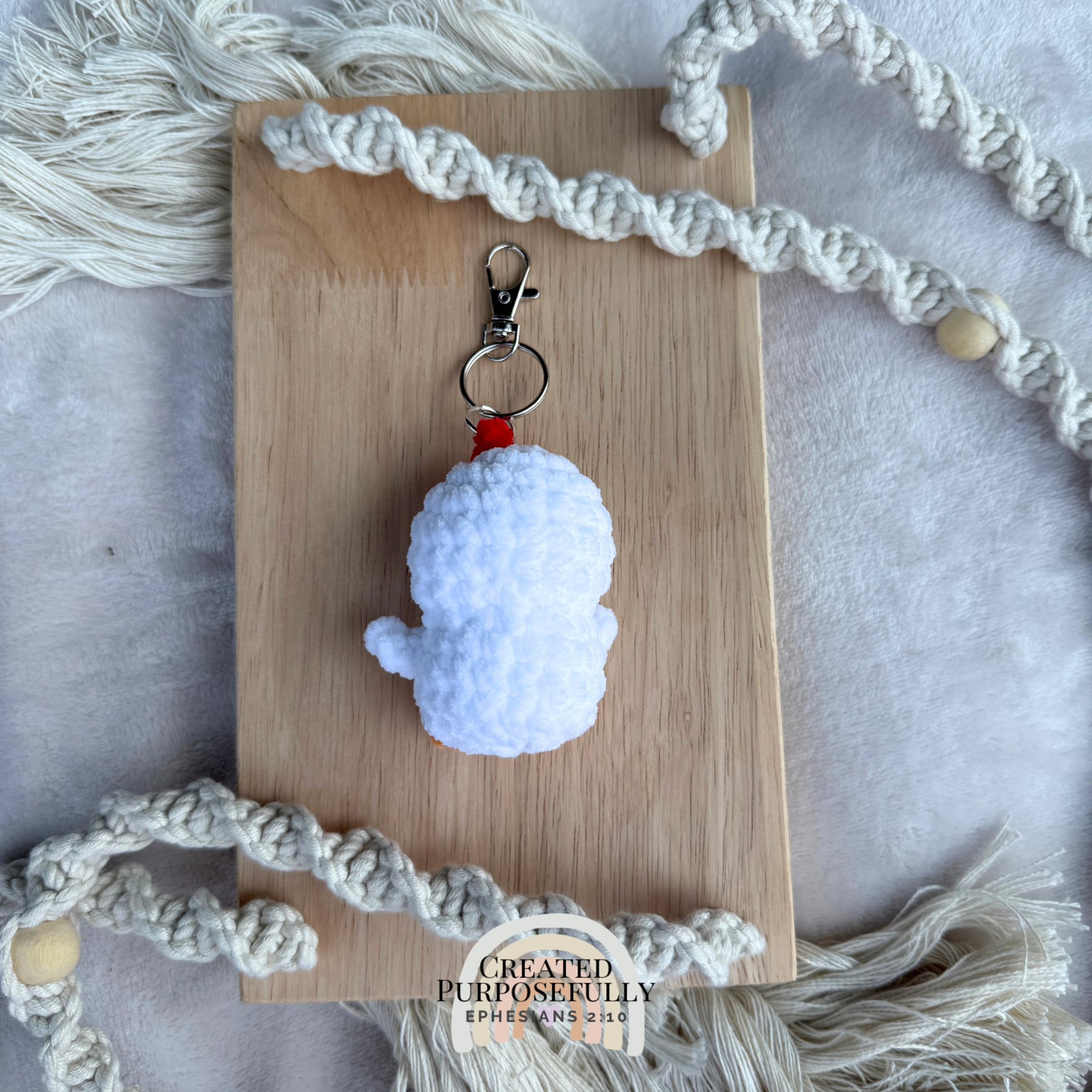 Handmade crochet chicken backpack buddy keychain made with soft plush yarn, a cute bag charm for backpacks, purses, keys, and gifts.