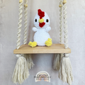 Handmade crochet chicken plush made with soft plush yarn and adorable farm animal details