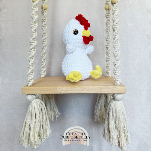 Handmade crochet chicken plush made with soft plush yarn and adorable farm animal details