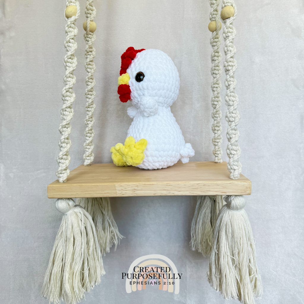 Handmade crochet chicken plush made with soft plush yarn and adorable farm animal details