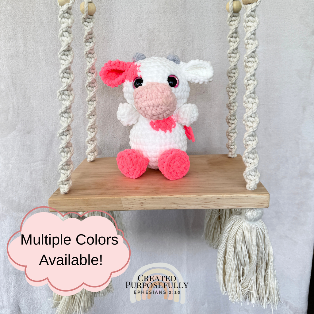 Handmade crochet cow plush in colorful designs made with soft plush yarn