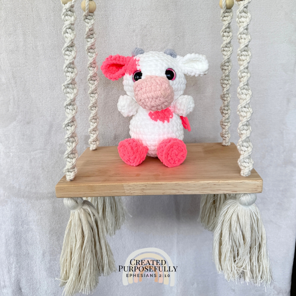 Handmade crochet cow plush in colorful designs made with soft plush yarn