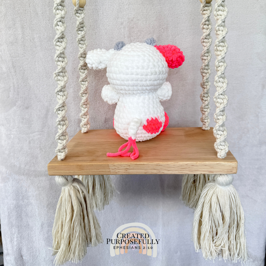 Handmade crochet cow plush in colorful designs made with soft plush yarn