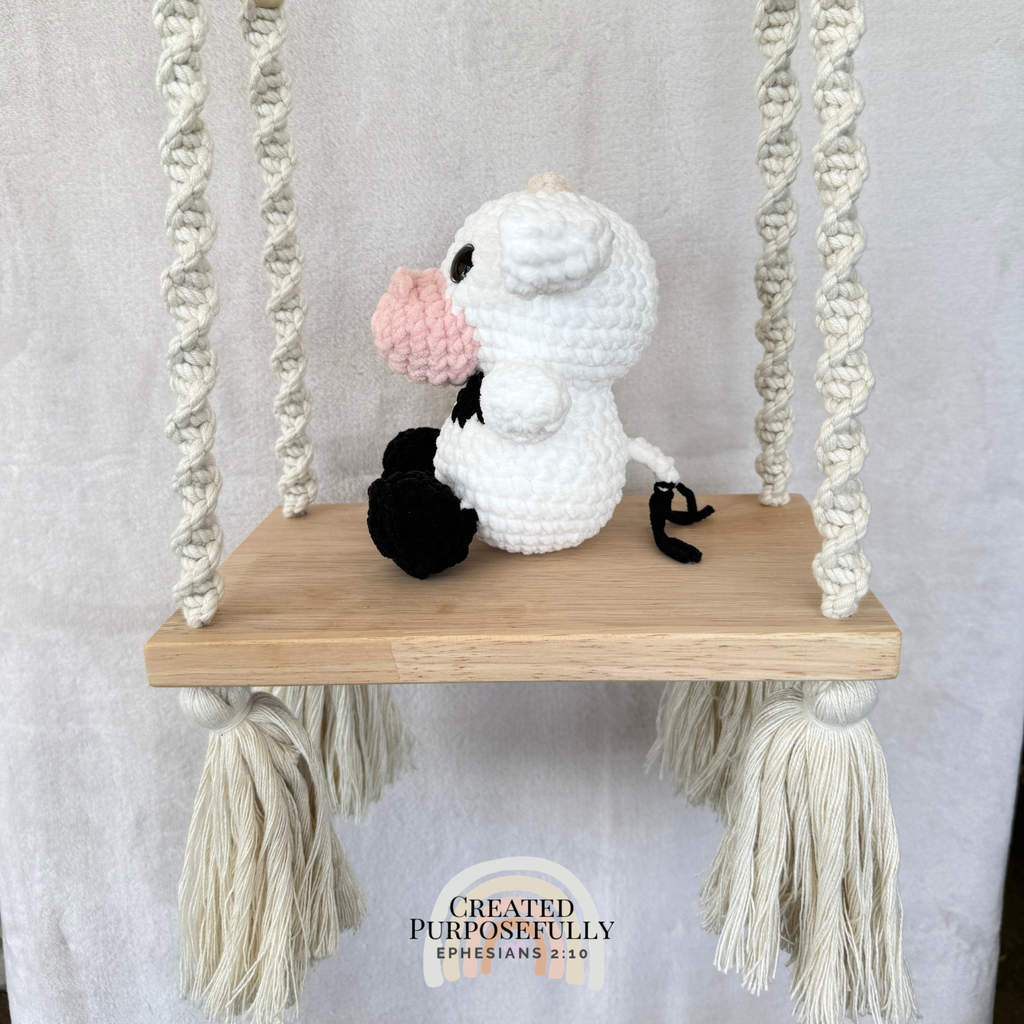 Handmade crochet cow plush in colorful designs made with soft plush yarn