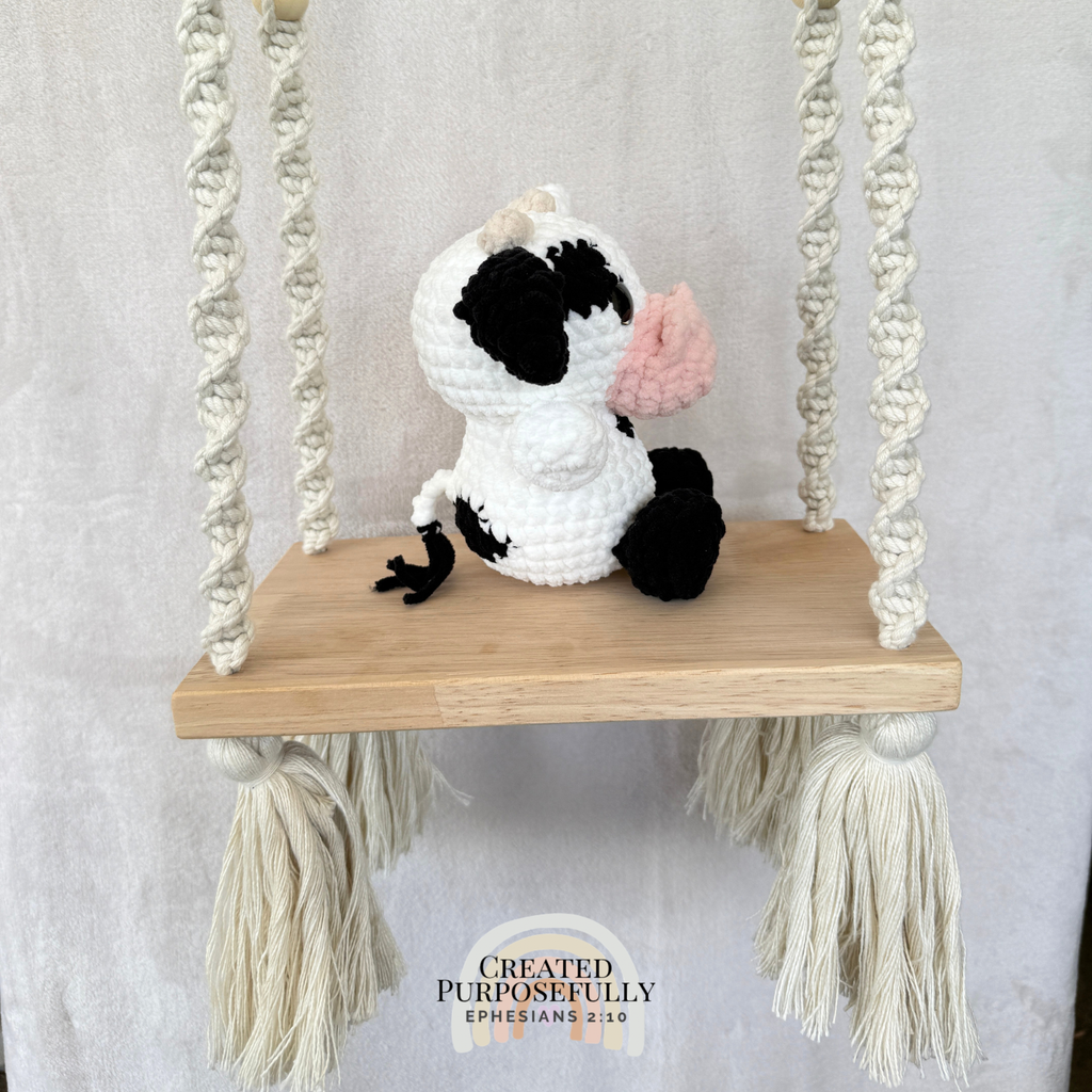 Handmade crochet cow plush in colorful designs made with soft plush yarn