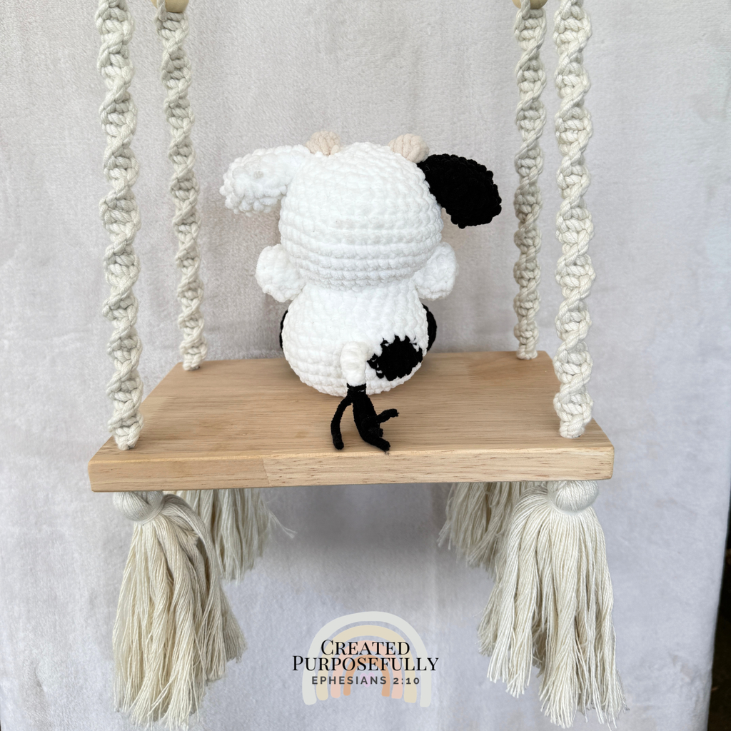 Handmade crochet cow plush in colorful designs made with soft plush yarn