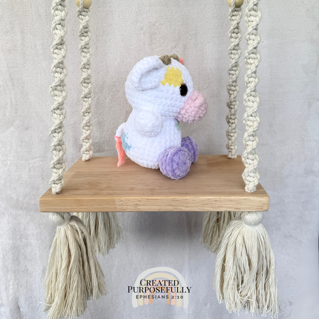 Handmade crochet cow plush in colorful and brown designs made with soft plush yarn