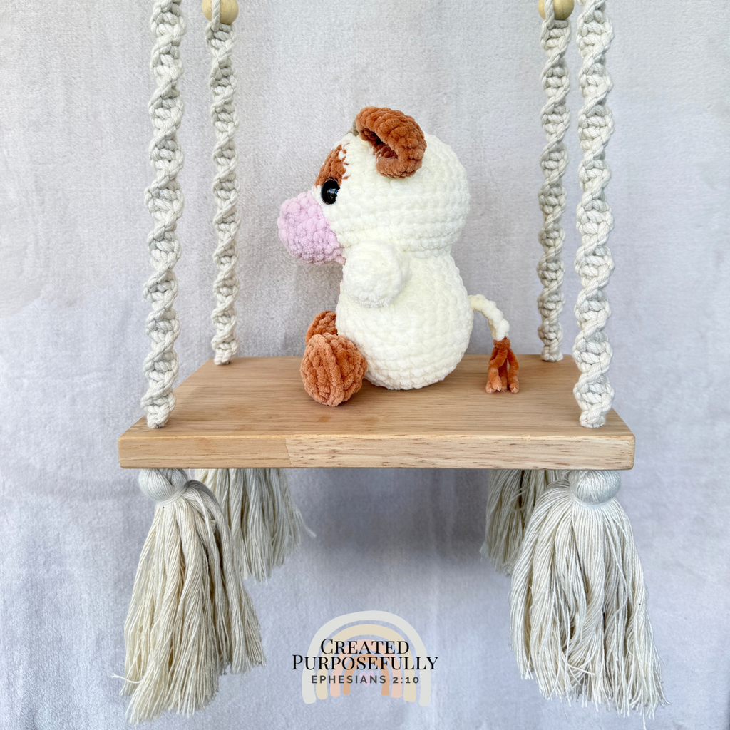 Handmade crochet cow plush in colorful and brown designs made with soft plush yarn
