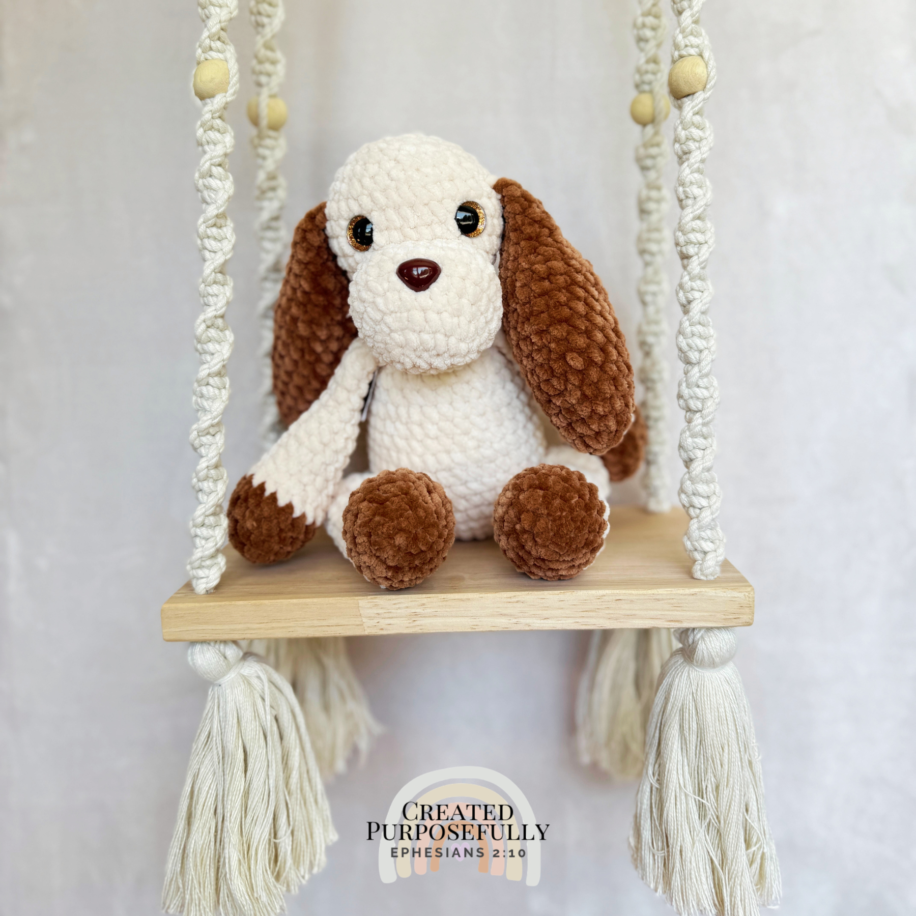 Handmade gray and tan crochet dog plush made with soft plush yarn and adorable handmade details