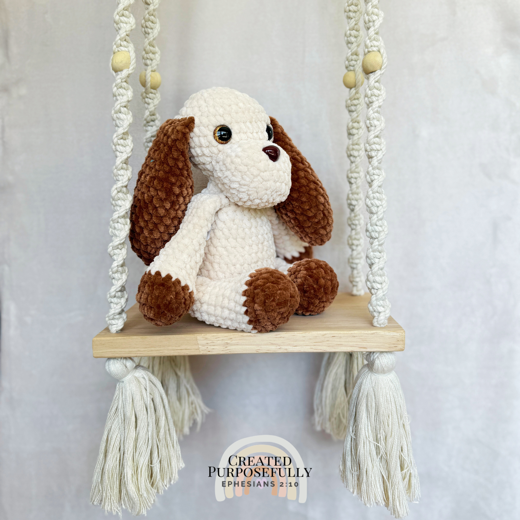 Handmade gray and tan crochet dog plush made with soft plush yarn and adorable handmade details