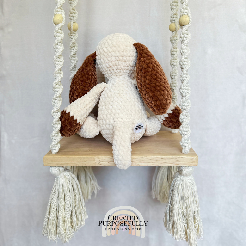 Handmade gray and tan crochet dog plush made with soft plush yarn and adorable handmade details