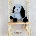 Handmade gray and tan crochet dog plush made with soft plush yarn and adorable handmade details