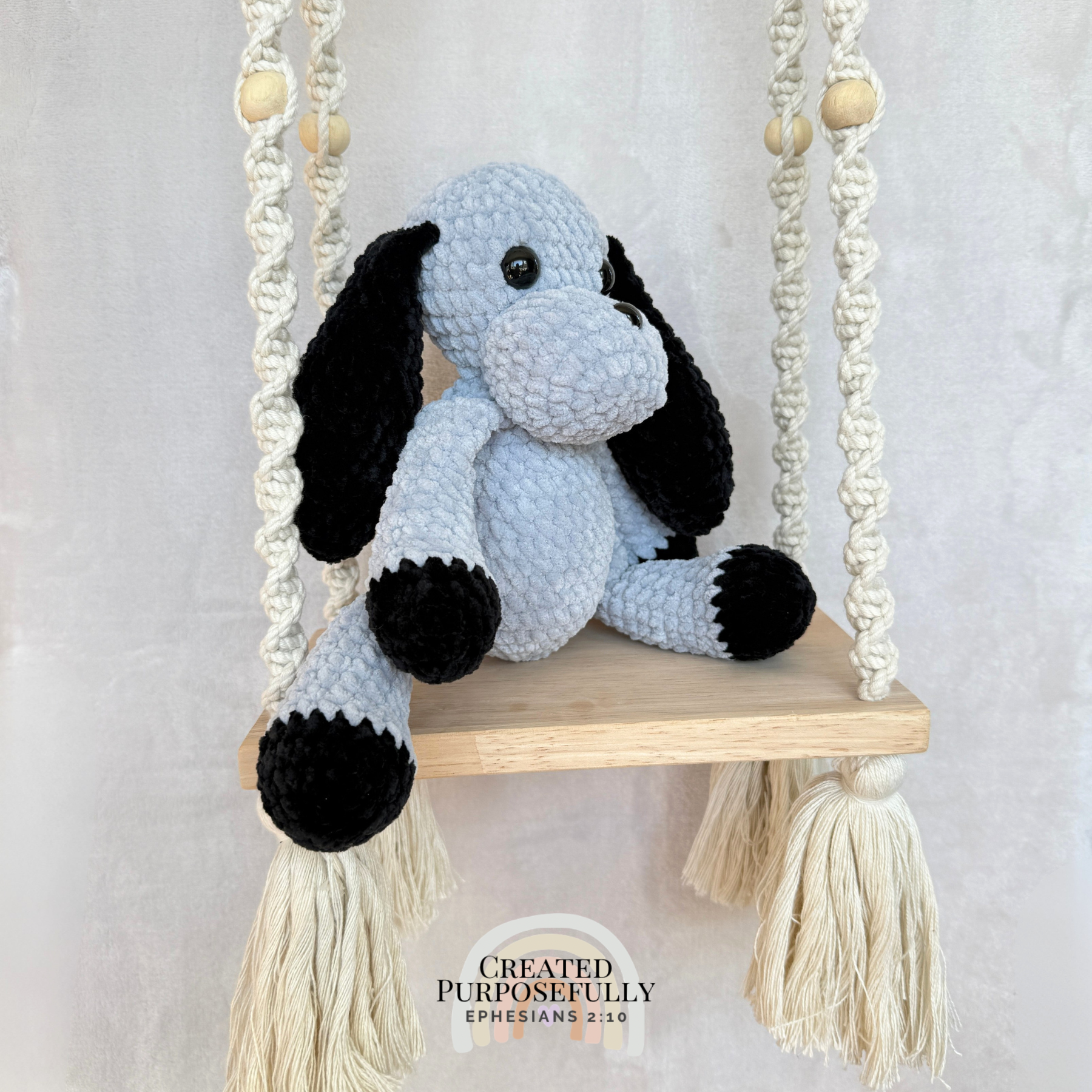 Handmade gray and tan crochet dog plush made with soft plush yarn and adorable handmade details