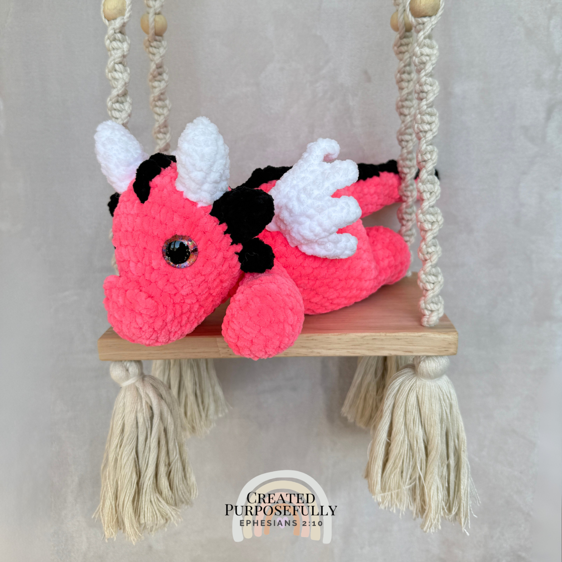Handmade crochet dragon plush made with soft plush yarn featuring wings and adorable handmade details