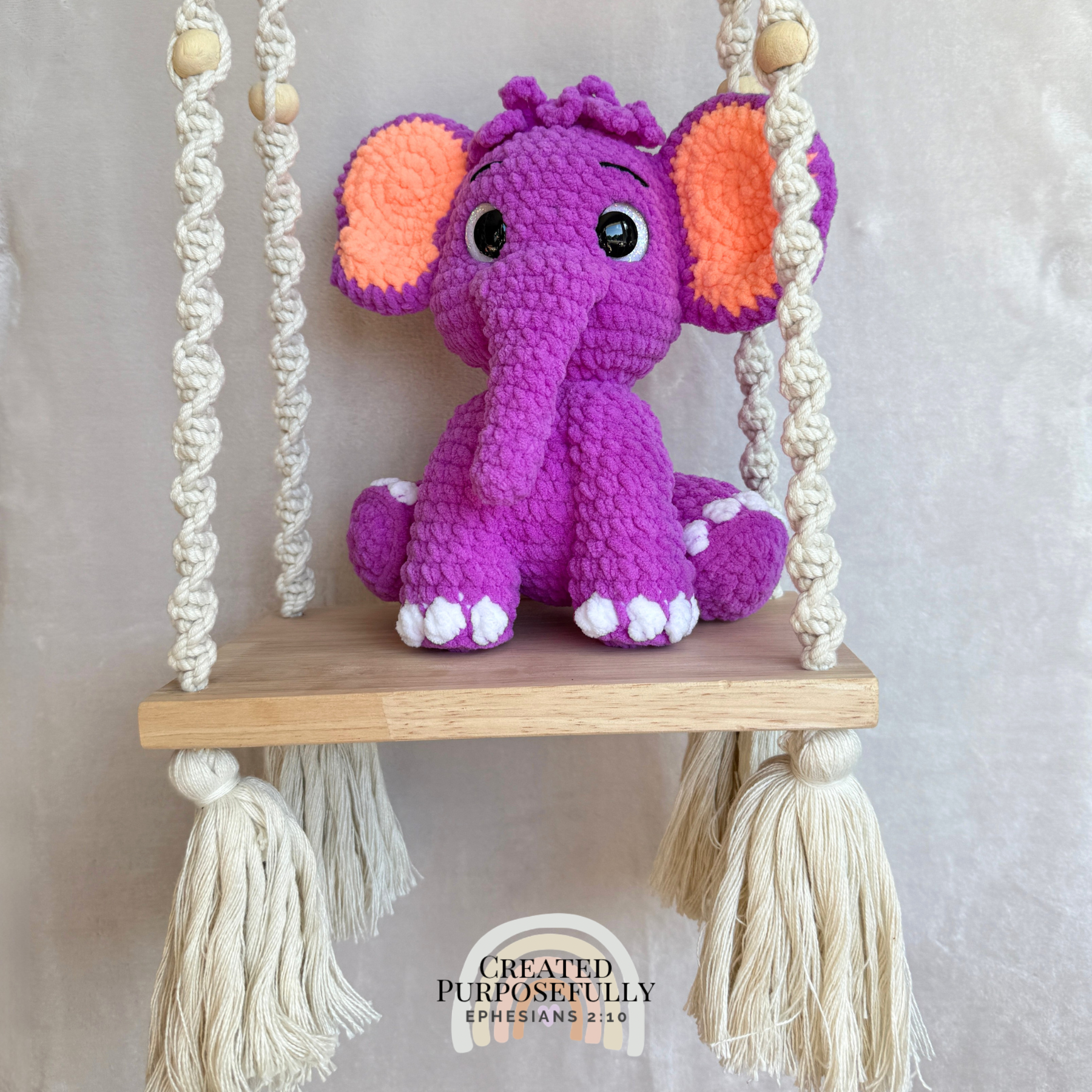 Handmade crochet elephant plush made with soft plush yarn and adorable handmade details