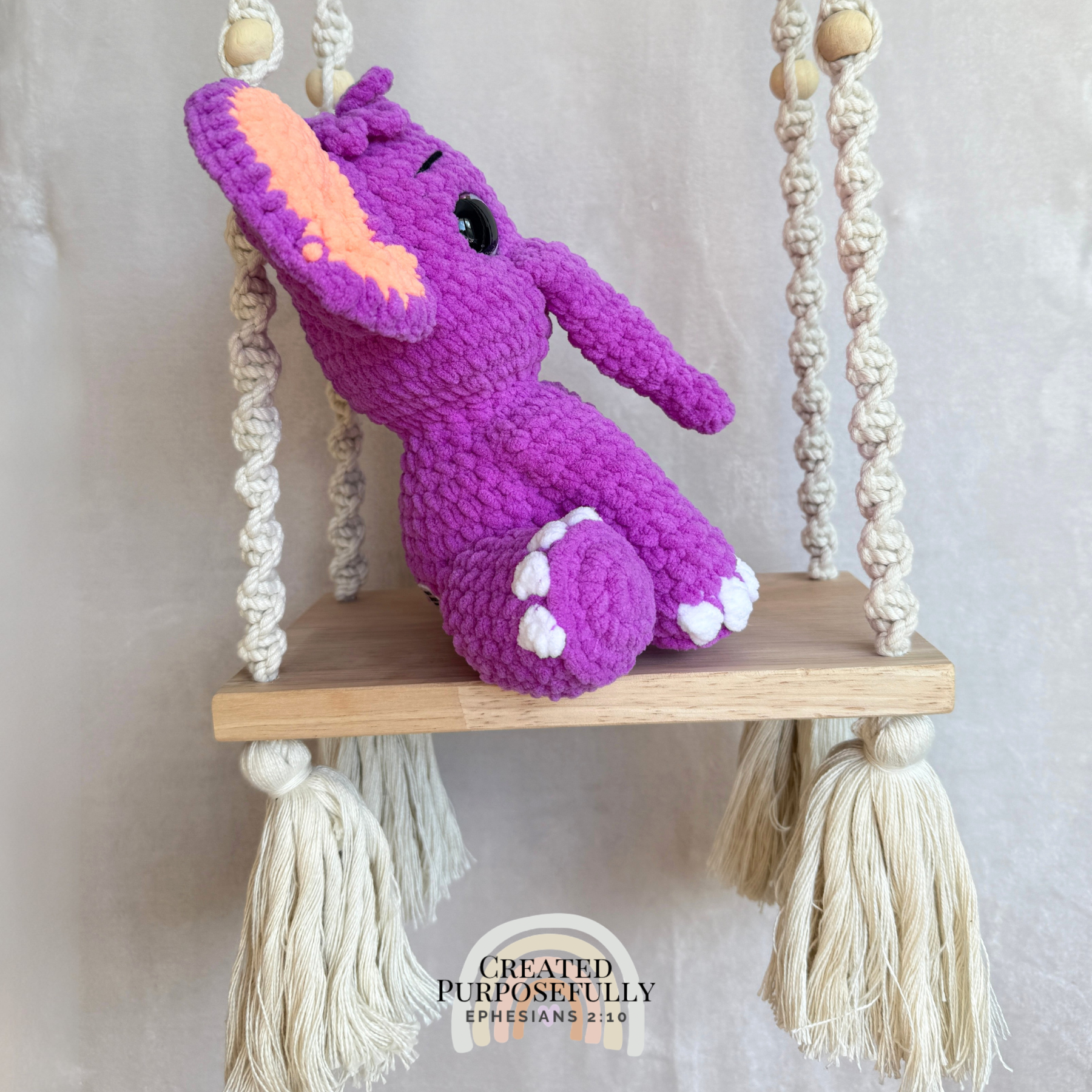 Handmade crochet elephant plush made with soft plush yarn and adorable handmade details